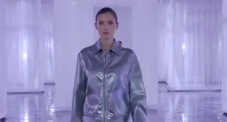New LTX-2.5 silver jacket fashion campaign in a white studio