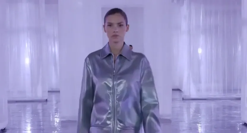 New LTX-2.5 silver jacket fashion campaign in a white studio