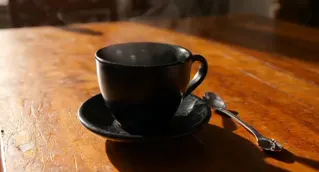 New LTX-2.5 matte black tea cup product film with steam